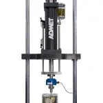 Material testing machine performing Dynamic loading test according ISO 14801 in a heated saline bath