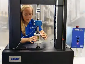 An ADMET Calibration engineer works on a system