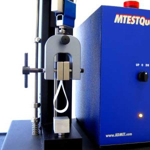 Loop Tack Strength Test Fixture on a table top tensile tester