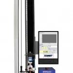 An eXpert 7601 single column material testing machine performing a tensile test with extensometer performing ASTM D412 Elastomer Testing