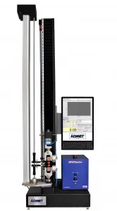 An eXpert 7601 single column material testing machine performing a tensile test with extensometer performing ASTM D412 Elastomer Testing