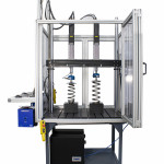 eXpert 5952 dual actuator system arranged for testing bicycle components and automotive springs with safety cage