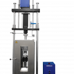 Axial-torsion testing machine with environmental chamber for cold testing