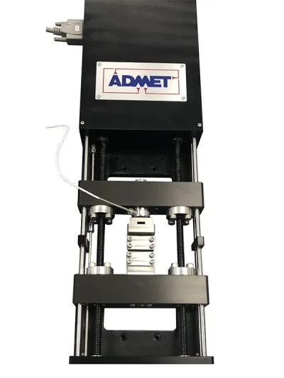 small universal testing machine performing a tensile test